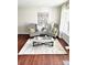 Cozy living room featuring two checkered armchairs, a plush rug, and a decorative coffee table at 269 Loch Stone St, Fort Mill, SC 29715