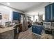 A rustic-style kitchen with granite countertops and modern stainless steel appliances at 3230 Creek Bend Ct, Sherrills Ford, NC 28673