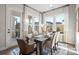 Bright dining area features natural light, decor, and a stylish table at 324 Basil Dr, Indian Trail, NC 28079