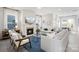 Inviting living room boasts a cozy fireplace, comfortable seating, and an abundance of natural light at 324 Basil Dr, Indian Trail, NC 28079