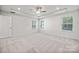 Spacious bedroom with great natural light, tray ceiling, and neutral carpeting at 4011 Vista Pine Dr, Charlotte, NC 28215