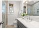 Modern bathroom with a glass-enclosed shower, a sleek vanity, and tile flooring at 4069 Rivendell Rd # 5, Denver, NC 28037