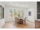 Dining area with large windows that offer a view of the backyard at 4069 Rivendell Rd # 5, Denver, NC 28037