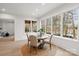 Dining area with natural light, a view to the lake, and modern finishes at 4069 Rivendell Rd # 5, Denver, NC 28037