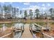 Picturesque lake view featuring a private dock with multiple boat slips at 4069 Rivendell Rd # 5, Denver, NC 28037