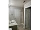 The bathroom features a double vanity, a stand-up shower, and neutral paint at 4904 Cornelia Dr, Charlotte, NC 28269