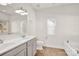 Bathroom featuring double sink vanity, neutral colors and tile flooring at 541 Settlers Grove Ln # 49, Salisbury, NC 28146