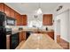 Charming kitchen with a granite island and modern appliances, perfect for culinary enthusiasts at 541 Settlers Grove Ln # 49, Salisbury, NC 28146