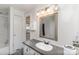 Bathroom featuring vanity with framed mirror and tub with shower at 6106 Ashley Dr, Concord, NC 28025