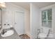 Bathroom featuring toilet, shower, and vanity with countertop sink at 6106 Ashley Dr, Concord, NC 28025