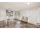 Open dining space featuring white table set and a view into the kitchen at 6106 Ashley Dr, Concord, NC 28025