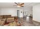 Open-concept living area flows into dining space, featuring stylish flooring and neutral tones at 6106 Ashley Dr, Concord, NC 28025