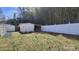 View of a fenced backyard with a shed and some natural features at 618 Camp Rotary Rd, Gastonia, NC 28052