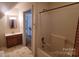 Bathroom featuring shower stall with vanity and mirror at 618 Camp Rotary Rd, Gastonia, NC 28052