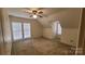 Bedroom featuring carpet, fan, and natural light at 618 Camp Rotary Rd, Gastonia, NC 28052