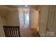 Upstairs hallway area featuring doorway into bedroom at 618 Camp Rotary Rd, Gastonia, NC 28052