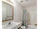 An ensuite bath featuring tile floors, a shower and a vanity sink at 657 Heathridge Rd, Rock Hill, SC 29732