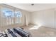 A bedroom with natural light streaming through window at 657 Heathridge Rd, Rock Hill, SC 29732