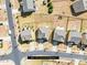 Aerial view of residential lot lines showing roof tops and backyards in a planned community at 7314 Rupell Dr, Charlotte, NC 28273