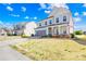 Charming two-story home featuring a welcoming porch and well-maintained lawn at 7314 Rupell Dr, Charlotte, NC 28273