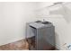 Modern laundry room with new washer and dryer units and clean white walls at 7314 Rupell Dr, Charlotte, NC 28273