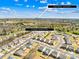 Aerial view of neighborhood homes with a distant skyline indicating Uptown Charlotte - 18 minute drive at 7314 Rupell Dr, Charlotte, NC 28273