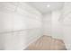 Spacious walk-in closet featuring wire shelving and carpeted floor at 7314 Rupell Dr, Charlotte, NC 28273