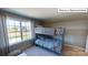 Charming bedroom featuring a bunk bed and a window overlooking the neighborhood at 1022 Merganser Way, Indian Trail, NC 28079