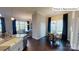 This light filled breakfast nook features dark hardwood floors and elegant decor at 1022 Merganser Way, Indian Trail, NC 28079