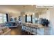 Modern kitchen and dining area, featuring an island with seating and stainless steel appliances at 1022 Merganser Way, Indian Trail, NC 28079