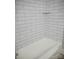 Recently renovated bathroom featuring tiled shower and flooring and modern finishes at 1041 Cutler Pl, Charlotte, NC 28212