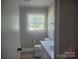 Clean, updated bathroom with modern fixtures, ample counter space, and bright natural light at 1041 Cutler Pl, Charlotte, NC 28212