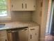 Bright kitchen featuring subway tile backsplash, modern cabinets, granite countertops and stainless steel dishwasher at 1041 Cutler Pl, Charlotte, NC 28212
