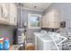 Functional laundry area with included washer and dryer at 1041 Cutler Pl, Charlotte, NC 28212