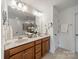 Well-appointed bathroom with a double sink vanity, modern fixtures, and great lighting at 113 Burlingame Ct # C, Mooresville, NC 28117