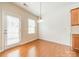 Bright breakfast nook filled with natural light and hardwood floors at 113 Burlingame Ct # C, Mooresville, NC 28117