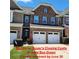 Charming brick townhome with a two-car garage and inviting curb appeal at 113 Burlingame Ct # C, Mooresville, NC 28117
