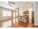 Open concept kitchen with stainless steel appliances and breakfast bar seating at 113 Burlingame Ct # C, Mooresville, NC 28117