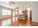 Open concept kitchen with stainless steel appliances and breakfast bar seating at 113 Burlingame Ct # C, Mooresville, NC 28117