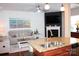 Open concept living space with granite counters, fireplace, and modern fixtures at 113 Burlingame Ct # C, Mooresville, NC 28117