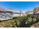 Fenced backyard with shed, grassy area, and privacy, perfect for outdoor activities and relaxation at 114 Indian Paint Brush Dr, Mooresville, NC 28115