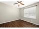 Bedroom with wood-look flooring and a window with blinds at 114 Indian Paint Brush Dr, Mooresville, NC 28115