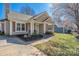 Charming house with neutral siding and a well-maintained lawn showcasing its inviting curb appeal at 114 Indian Paint Brush Dr, Mooresville, NC 28115