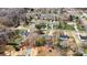 Community aerial view showing a single Gathering home neighborhood with mature trees and surrounding landscape at 1140 Knollwood Dr, Claremont, NC 28610