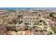 Community aerial view showing a single Gathering home neighborhood with mature trees and surrounding landscape at 1140 Knollwood Dr, Claremont, NC 28610