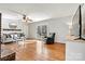 Bright living room with hardwood floors, neutral decor and an abundance of natural light at 1140 Knollwood Dr, Claremont, NC 28610