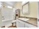 Well-lit bathroom featuring a tub-shower combo and a vanity with modern fixtures at 1370 Martin Rd, Hickory Grove, SC 29717