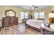 Bedroom featuring hardwood floors, natural light from large windows, and neutral decor at 1370 Martin Rd, Hickory Grove, SC 29717