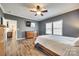 Comfortable main bedroom featuring hardwood floors, a ceiling fan, and neutral wall color at 1370 Martin Rd, Hickory Grove, SC 29717