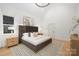 Bright bedroom featuring wood floors, vaulted ceiling and modern chandelier at 1465 Highcrest Way, Rock Hill, SC 29730